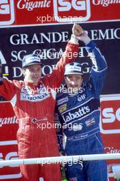 Gerhard Berger (AUT) McLaren 2nd position Nigel Mansell (GBR) Williams 1st position celebrate podium