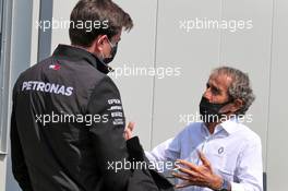 (L to R): Toto Wolff (GER) Mercedes AMG F1 Shareholder and Executive Director with Alain Prost (FRA) Renault F1 Team Non-Executive Director. 09.08.2020. Formula 1 World Championship, Rd 5, 70th Anniversary Grand Prix, Silverstone, England, Race Day.