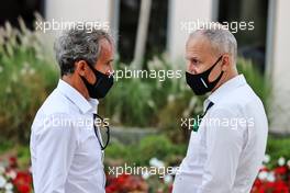 (L to R): Alain Prost (FRA) Alpine F1 Team Non-Executive Director with Stephane Cohen (BEL) Bell Helmet CEO. 26.03.2021. Formula 1 World Championship, Rd 1, Bahrain Grand Prix, Sakhir, Bahrain, Practice Day