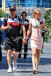 (L to R): Valtteri Bottas (FIN) Alfa Romeo F1 Team with his girlfriend Tiffany Cromwell (AUS) Professional Cyclist. 12.06.2022. Formula 1 World Championship, Rd 8, Azerbaijan Grand Prix, Baku Street Circuit, Azerbaijan, Race Day.