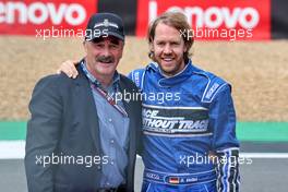 (L to R): Nigel Mansell (GBR) with Sebastian Vettel (GER) Aston Martin F1 Team. 03.07.2022. Formula 1 World Championship, Rd 10, British Grand Prix, Silverstone, England, Race Day.
