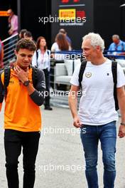 (L to R): Lando Norris (GBR) McLaren with Mark Berryman (GBR) Add Motorsports Director and Driver Manager. 09.09.2022. Formula 1 World Championship, Rd 16, Italian Grand Prix, Monza, Italy, Practice Day.
