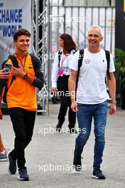 (L to R): Lando Norris (GBR) McLaren withMark Berryman (GBR) Add Motorsports Director and Driver Manager. 09.09.2022. Formula 1 World Championship, Rd 16, Italian Grand Prix, Monza, Italy, Practice Day.