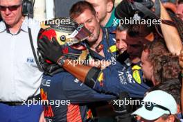 Race winner Max Verstappen (NLD) Red Bull Racing celebrates with the team in parc ferme. 05.11.2023. Formula 1 World Championship, Rd 21, Brazilian Grand Prix, Sao Paulo, Brazil, Race Day.