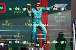 Fernando Alonso (ESP) Aston Martin F1 Team AMR23 celebrates his third position on the podium. 05.11.2023. Formula 1 World Championship, Rd 21, Brazilian Grand Prix, Sao Paulo, Brazil, Race Day.