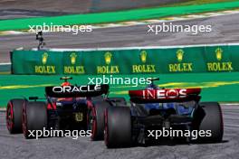 Sergio Perez (MEX) Red Bull Racing RB19 leads Lewis Hamilton (GBR) Mercedes AMG F1 W14. 05.11.2023. Formula 1 World Championship, Rd 21, Brazilian Grand Prix, Sao Paulo, Brazil, Race Day.