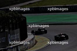 Max Verstappen (NLD) Red Bull Racing RB19 leads Lando Norris (GBR) McLaren MCL60. 04.11.2023. Formula 1 World Championship, Rd 21, Brazilian Grand Prix, Sao Paulo, Brazil, Sprint Day.
