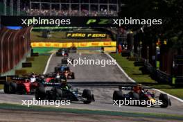 (L to R): Lewis Hamilton (GBR) Mercedes AMG F1 W14 and Sergio Perez (MEX) Red Bull Racing RB19 battle for position. 04.11.2023. Formula 1 World Championship, Rd 21, Brazilian Grand Prix, Sao Paulo, Brazil, Sprint Day.