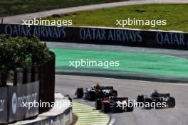 Sergio Perez (MEX) Red Bull Racing RB19 leads Charles Leclerc (MON) Ferrari SF-23 and Lewis Hamilton (GBR) Mercedes AMG F1 W14. 04.11.2023. Formula 1 World Championship, Rd 21, Brazilian Grand Prix, Sao Paulo, Brazil, Sprint Day.