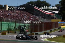 (L to R): George Russell (GBR) Mercedes AMG F1 W14 and Sergio Perez (MEX) Red Bull Racing RB19 battle for position. 04.11.2023. Formula 1 World Championship, Rd 21, Brazilian Grand Prix, Sao Paulo, Brazil, Sprint Day.