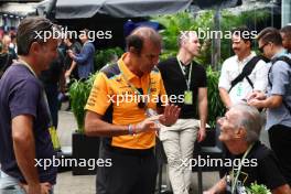 (L to R): Christian Fittipaldi (BRA) with Emanuele Pirro (ITA) McLaren Driver Development Programme Leader and Wilson Fittipaldi (BRA). 05.11.2023. Formula 1 World Championship, Rd 21, Brazilian Grand Prix, Sao Paulo, Brazil, Race Day.