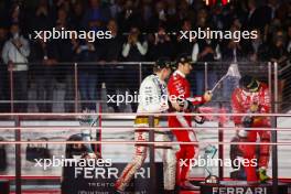 (L to R): Race winner Max Verstappen (NLD) Red Bull Racing celebrates on the podium with second placed Charles Leclerc (MON) Ferrari and third placed Sergio Perez (MEX) Red Bull Racing. 18.11.2023. Formula 1 World Championship, Rd 22, Las Vegas Grand Prix, Las Vegas, Nevada, USA, Race Day.