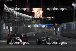 Lewis Hamilton (GBR) Mercedes AMG F1 W14 and Kevin Magnussen (DEN) Haas VF-23 battle for position. 18.11.2023. Formula 1 World Championship, Rd 22, Las Vegas Grand Prix, Las Vegas, Nevada, USA, Race Day.