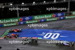 Max Verstappen (NLD) Red Bull Racing RB19 and Charles Leclerc (MON) Ferrari SF-23 battle for the lead at the start of the race. 18.11.2023. Formula 1 World Championship, Rd 22, Las Vegas Grand Prix, Las Vegas, Nevada, USA, Race Day.