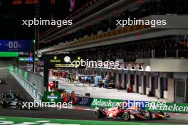 (L to R): Charles Leclerc (MON) Ferrari SF-23 and Max Verstappen (NLD) Red Bull Racing RB19 at the start of the race. 18.11.2023. Formula 1 World Championship, Rd 22, Las Vegas Grand Prix, Las Vegas, Nevada, USA, Race Day.