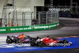 Charles Leclerc (MON) Ferrari SF-23 and Max Verstappen (NLD) Red Bull Racing RB19 at the start of the race. 18.11.2023. Formula 1 World Championship, Rd 22, Las Vegas Grand Prix, Las Vegas, Nevada, USA, Race Day.