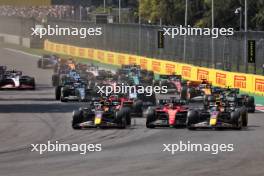 (L to R): Max Verstappen (NLD) Red Bull Racing RB19; Charles Leclerc (MON) Ferrari SF-23; and Sergio Perez (MEX) Red Bull Racing RB19 - crash at the start of the race. 29.10.2023. Formula 1 World Championship, Rd 20, Mexican Grand Prix, Mexico City, Mexico, Race Day.
