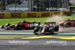 (L to R): Charles Leclerc (MON) Ferrari SF-23 and Sergio Perez (MEX) Red Bull Racing RB19 - crash at the start of the race. 29.10.2023. Formula 1 World Championship, Rd 20, Mexican Grand Prix, Mexico City, Mexico, Race Day.