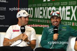 (L to R): Sergio Perez (MEX) Red Bull Racing and Fernando Alonso (ESP) Aston Martin F1 Team in the FIA Press Conference. 26.10.2023. Formula 1 World Championship, Rd 20, Mexican Grand Prix, Mexico City, Mexico, Preparation Day.