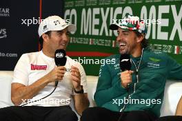 (L to R): Sergio Perez (MEX) Red Bull Racing and Fernando Alonso (ESP) Aston Martin F1 Team in the FIA Press Conference. 26.10.2023. Formula 1 World Championship, Rd 20, Mexican Grand Prix, Mexico City, Mexico, Preparation Day.