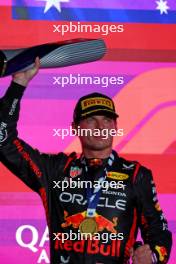 Race winner Max Verstappen (NLD) Red Bull Racing celebrates on the podium. 08.10.2023. Formula 1 World Championship, Rd 18, Qatar Grand Prix, Doha, Qatar, Race Day.