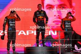 The podium (L to R): Oscar Piastri (AUS) McLaren, second; Max Verstappen (NLD) Red Bull Racing, race winner; Lando Norris (GBR) McLaren, third. 08.10.2023. Formula 1 World Championship, Rd 18, Qatar Grand Prix, Doha, Qatar, Race Day.