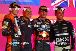 The podium (L to R): Oscar Piastri (AUS) McLaren, second; Gianpiero Lambiase (ITA) Red Bull Racing Engineer; Max Verstappen (NLD) Red Bull Racing, race winner; Lando Norris (GBR) McLaren, third. 08.10.2023. Formula 1 World Championship, Rd 18, Qatar Grand Prix, Doha, Qatar, Race Day.