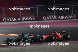 (L to R): Lance Stroll (CDN) Aston Martin F1 Team AMR23 and Charles Leclerc (MON) Ferrari SF-23 battle for position. 08.10.2023. Formula 1 World Championship, Rd 18, Qatar Grand Prix, Doha, Qatar, Race Day.
