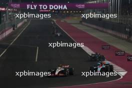 Nico Hulkenberg (GER) Haas VF-23 and Alexander Albon (THA) Williams Racing FW45 battle for position. 08.10.2023. Formula 1 World Championship, Rd 18, Qatar Grand Prix, Doha, Qatar, Race Day.
