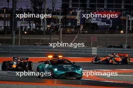 Max Verstappen (NLD) Red Bull Racing RB19 leads behind the Aston Martin FIA Safety Car. 08.10.2023. Formula 1 World Championship, Rd 18, Qatar Grand Prix, Doha, Qatar, Race Day.