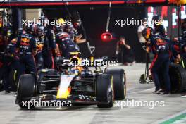 Sergio Perez (MEX) Red Bull Racing RB19 makes a pit stop. 08.10.2023. Formula 1 World Championship, Rd 18, Qatar Grand Prix, Doha, Qatar, Race Day.