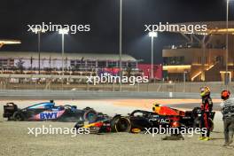 Sergio Perez (MEX) Red Bull Racing RB19 and Esteban Ocon (FRA) Alpine F1 Team A523 crashed out of the race. 07.10.2023. Formula 1 World Championship, Rd 18, Qatar Grand Prix, Doha, Qatar, Sprint Day.