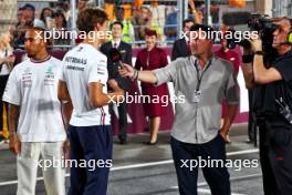 Will Buxton (GBR) F1 Digital Presenter (Right) with George Russell (GBR) Mercedes AMG F1 and Lewis Hamilton (GBR) Mercedes AMG F1 on the drivers' parade. 08.10.2023. Formula 1 World Championship, Rd 18, Qatar Grand Prix, Doha, Qatar, Race Day.