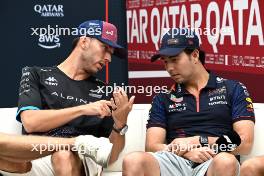 (L to R): Pierre Gasly (FRA) Alpine F1 Team and Sergio Perez (MEX) Red Bull Racing in the FIA Press Conference. 05.10.2023. Formula 1 World Championship, Rd 18, Qatar Grand Prix, Doha, Qatar, Preparation Day.