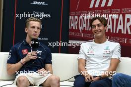 (L to R): Liam Lawson (NZL) AlphaTauri and George Russell (GBR) Mercedes AMG F1 in the FIA Press Conference. 05.10.2023. Formula 1 World Championship, Rd 18, Qatar Grand Prix, Doha, Qatar, Preparation Day.