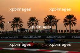 Charles Leclerc (FRA), Scuderia Ferrari Alex Albon (THA), Williams F1 Team  24.11.2023. Formula 1 World Championship, Rd 23, Abu Dhabi Grand Prix, Yas Marina Circuit, Abu Dhabi, Practice Day.
