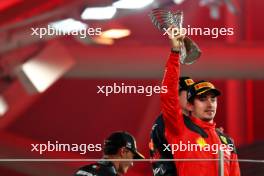 Charles Leclerc (MON) Ferrari celebrates his second position on the podium. 26.11.2023. Formula 1 World Championship, Rd 23, Abu Dhabi Grand Prix, Yas Marina Circuit, Abu Dhabi, Race Day.
