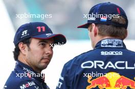 Sergio Perez (MEX), Red Bull Racing and Max Verstappen (NLD), Red Bull Racing  26.11.2023. Formula 1 World Championship, Rd 23, Abu Dhabi Grand Prix, Yas Marina Circuit, Abu Dhabi, Race Day.