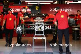 Ferrari SF-23 being prepared in the pit garage. 23.11.2023. Formula 1 World Championship, Rd 23, Abu Dhabi Grand Prix, Yas Marina Circuit, Abu Dhabi, Preparation Day.