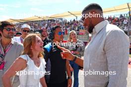 (L to R): Geri Horner (GBR) Singer with Anthony Joshua (GBR) Boxer and Otro Capital Alpine F1 Team Investor on the grid. 22.10.2023. Formula 1 World Championship, Rd 19, United States Grand Prix, Austin, Texas, USA, Race Day.