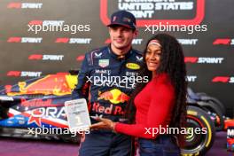 Winner Max Verstappen (NLD) Red Bull Racing in Sprint parc ferme with Sha'Carri Richardson (USA) Athlete. 21.10.2023. Formula 1 World Championship, Rd 19, United States Grand Prix, Austin, Texas, USA, Sprint Day.