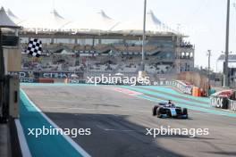 Race winner Jack Doohan (AUS) Invicta Virtuosi Racing takes the chequered flag at the end of the race. 26.11.2023. Formula 2 Championship, Rd 14, Yas Marina Circuit, Abu Dhabi, UAE, Feature Race, Sunday.