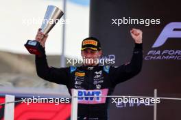 Victor Martins (FRA) ART Grand Prix celebrates his second position on the podium. 26.11.2023. Formula 2 Championship, Rd 14, Yas Marina Circuit, Abu Dhabi, UAE, Feature Race, Sunday.
