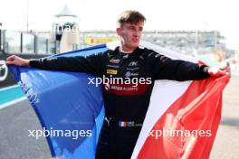 Theo Pourchaire (FRA) ART Grand Prix celebrates winning the F2 Championship in parc ferme. 26.11.2023. Formula 2 Championship, Rd 14, Yas Marina Circuit, Abu Dhabi, UAE, Feature Race, Sunday.