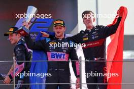 (L to R): Rookie of the year Victor Martins (FRA) ART Grand Prix celebrates with F2 Champion Theo Pourchaire (FRA) ART Grand Prix on the podium. 26.11.2023. Formula 2 Championship, Rd 14, Yas Marina Circuit, Abu Dhabi, UAE, Feature Race, Sunday.