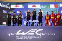 The podium (L to R): Mike Conway (GBR), Kamui Kobayashi (JPN), Jose Maria Lopez (ARG) #07 Toyota Gazoo Racing, second; race winners Sebastien Buemi (SUI) / Brendon Hartley (NZL) / Ryo Hirakawa (JPN) #08 Toyota Gazoo Racing; Antonio Fuoco (ITA), Miguel Molina (ESP), Nicklas Nielsen (DEN) #50 Ferrari AF Corse, third. 04.11.2023. FIA World Endurance Championship, Round 7, Eight Hours of Bahrain, Sakhir, Bahrain, Saturday.
