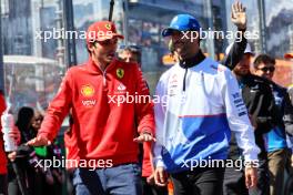 (L to R): Carlos Sainz Jr (ESP) Ferrari and Daniel Ricciardo (AUS) RB on the drivers' parade. 24.03.2024. Formula 1 World Championship, Rd 3, Australian Grand Prix, Albert Park, Melbourne, Australia, Race Day.