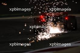 George Russell (GBR) Mercedes AMG F1 W15 sends sparks flying. 01.03.2024. Formula 1 World Championship, Rd 1, Bahrain Grand Prix, Sakhir, Bahrain, Qualifying Day.