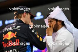 (L to R): Max Verstappen (NLD) Red Bull Racing with Mohammed Bin Sulayem (UAE) FIA President in qualifying parc ferme. 01.03.2024. Formula 1 World Championship, Rd 1, Bahrain Grand Prix, Sakhir, Bahrain, Qualifying Day.