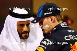 (L to R): Mohammed Bin Sulayem (UAE) FIA President with pole sitter Max Verstappen (NLD) Red Bull Racing in qualifying parc ferme. 01.03.2024. Formula 1 World Championship, Rd 1, Bahrain Grand Prix, Sakhir, Bahrain, Qualifying Day.